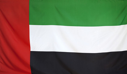 Obraz premium UAE Flag real fabric seamless close up