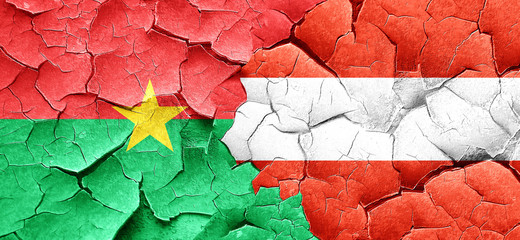 Burkina Faso flag with Austria flag on a grunge cracked wall