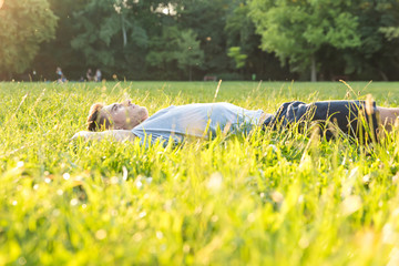 A young man lying in the Grass	