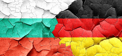 bulgaria flag with Germany flag on a grunge cracked wall