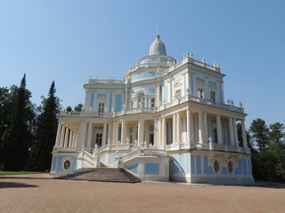 Obraz premium beautiful vintage blue ann white building with columns and staircase