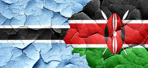 Botswana flag with Kenya flag on a grunge cracked wall
