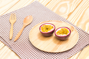Passion fruit on wood table