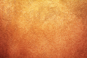 Яркий светлый оранжевый фактурный абстрактный фон стены
