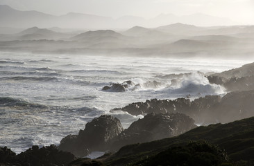 Fototapeta na wymiar Atlantic Ocean crashing on the shore close to Hermanus in the Western Cape South Africa