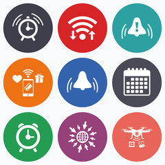 Alarm clock icons. Wake up bell signs symbols.