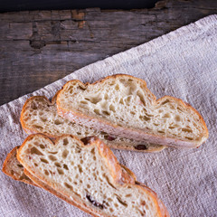 ciabatta, fresh bread, fresh ciabatta on the table. Italian ciabatta bread cut in slices.