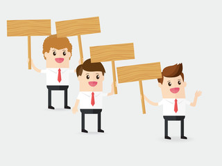 collaborative teamwork of  businessman holding up a blank wooden sign