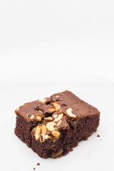 Fototapeta na wymiar Brownie chocolate cake with raisin and cashews