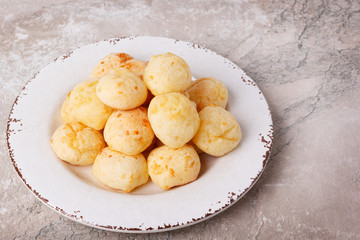 Brazilian snack cheese bread (pao de queijo) on plate