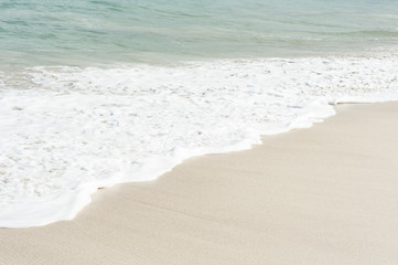 Wave on White Sand Beach