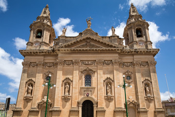 Naxxar, Malta - 2016, June 11th : The facade of the historic Our Lady of Victories parish church of...