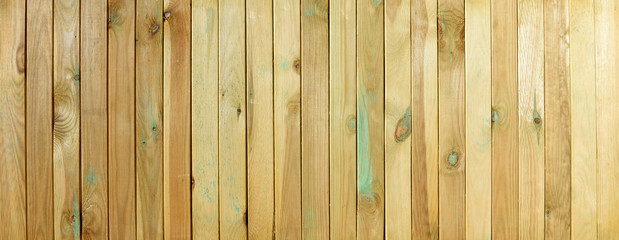 Obraz premium Top view of wooden table. Grooved pine boards with knots