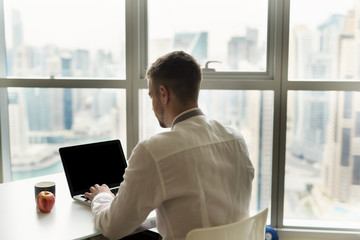 Businessman working in office.