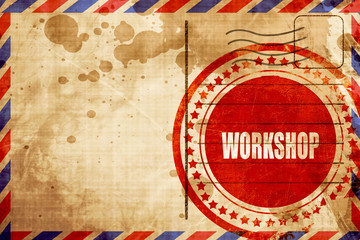 workshop, red grunge stamp on an airmail background