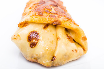 Russian pancake stuffed with chicken.