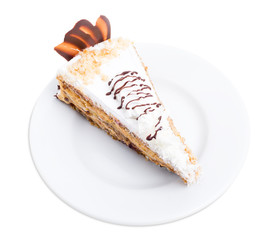Delicious cake with chocolate curl and coconuts.