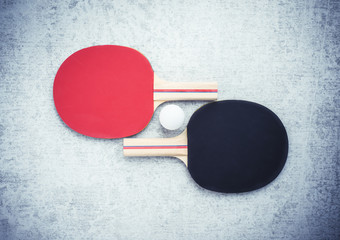 Ping pong or table tennis paddles and ball. Sport equipment with tabletennis rackets for leisure activity. Concept of game, recreation and playing ping-pong. - 113565515