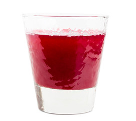Glass with cherry jelly.