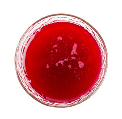 Glass with cherry jelly.