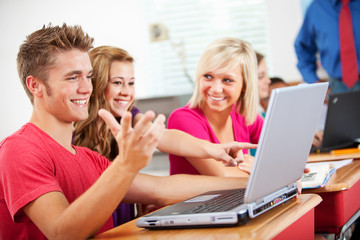 Fototapeta na wymiar High School: Teen Students Using Laptops in Class