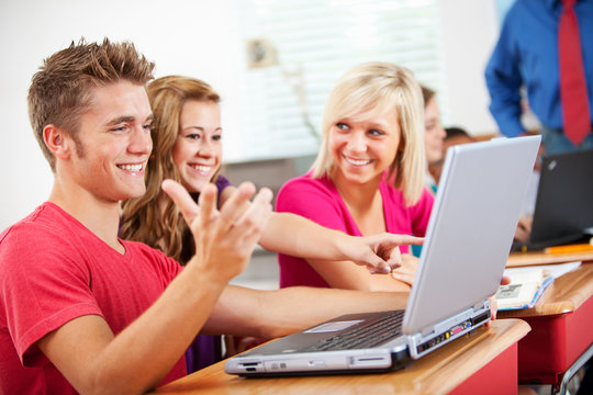 High School: Teen Students Using Laptops in Class