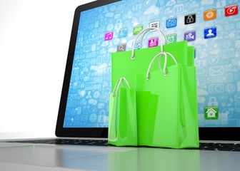 laptop and  shopping pags on white background. 3d rendering.