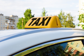 lamp with taxi word on car roof