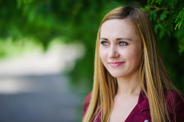 Obraz premium blonde girl on green background