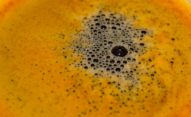 Overhead view of a cup espresso coffee