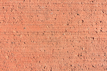 Orange cement sidewalk surface
