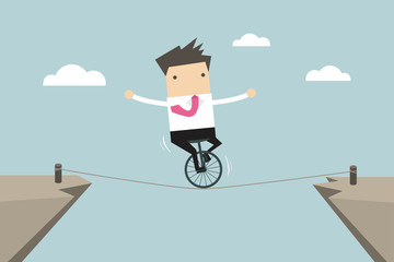 Businessman balancing on the rope vector © Windawake