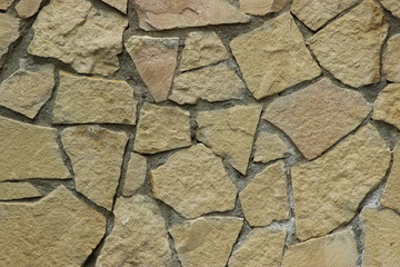 wall of light colored stone