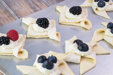 Uncooked berries cream cheese pastries