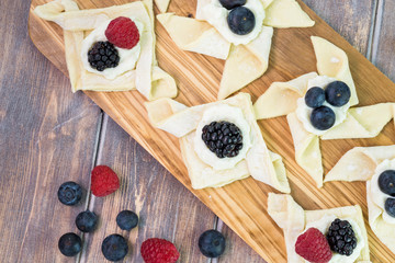 Uncooked berries cream cheese pastries