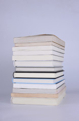 Stack of books isolated on white background.