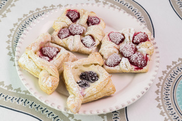 Fresh baked berries cream cheese pastries.