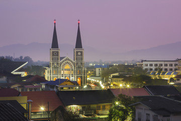 Obraz premium The Catholic Church among of the community in Thailand
