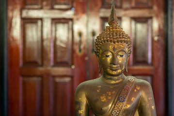 Fototapeta premium Brass statue of Buddha