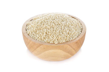 white sesame in wooden bowl on white background