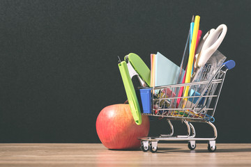 Shopping cart with school supplies