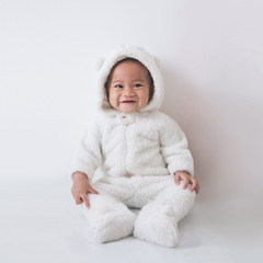 little baby girl sitting on the floor