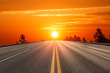 New asphalt highway at sunset scene