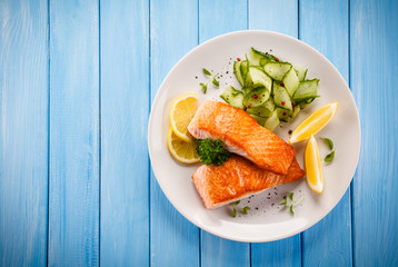 Grilled salmon steaks and vegetables
