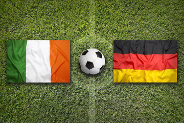 Ireland vs. Germany flags on soccer field