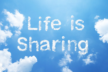 "Life is sharing" cloud word on sky.