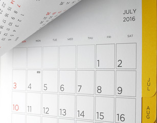 cardboard desk calendar with days and dates of july 2016 in grid, acronym letters us in fourth of...