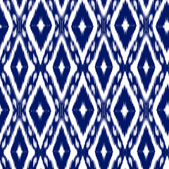Seamless pattern Tribal Art Ikat Ogee in traditional classic blue and white colors. Boho style.