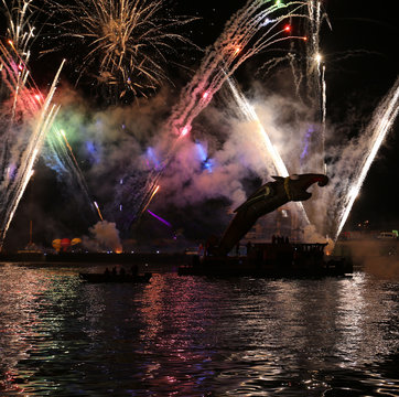  Yearly Great Dragons Parade connected with the fireworks display, taking place on the river Vistula at Wawel. Cracow , Poland
