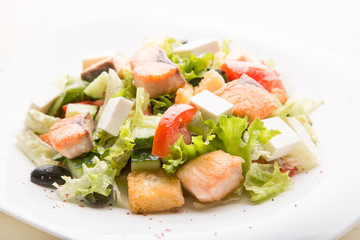 Greek salad with salmon